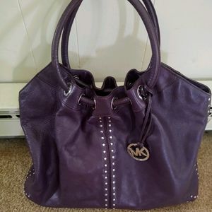 Large Micheal Kors purple leather purse